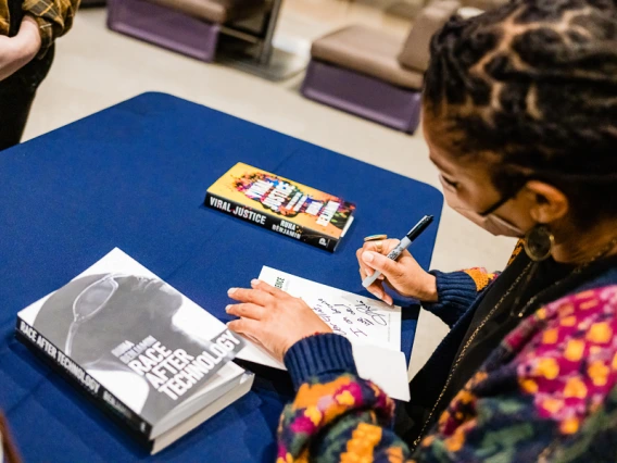 Speaker signing books