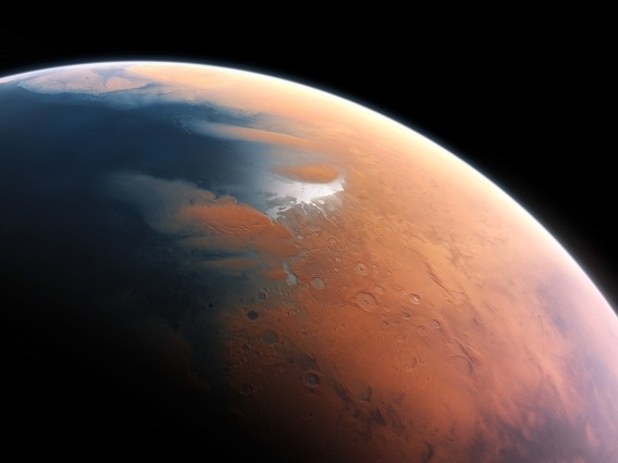 This artist’s impression shows how Mars may have looked about four billion years ago.