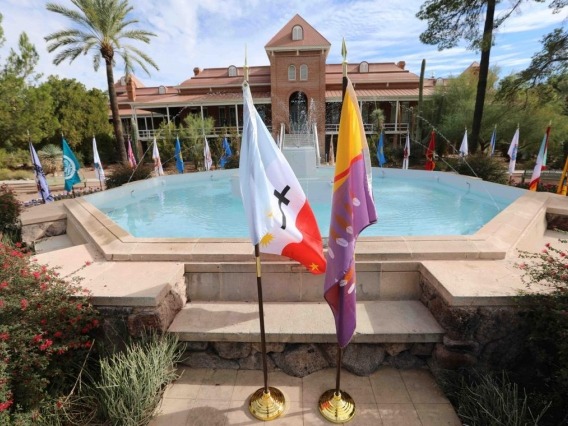 Native American flags around the fountain at Old Main