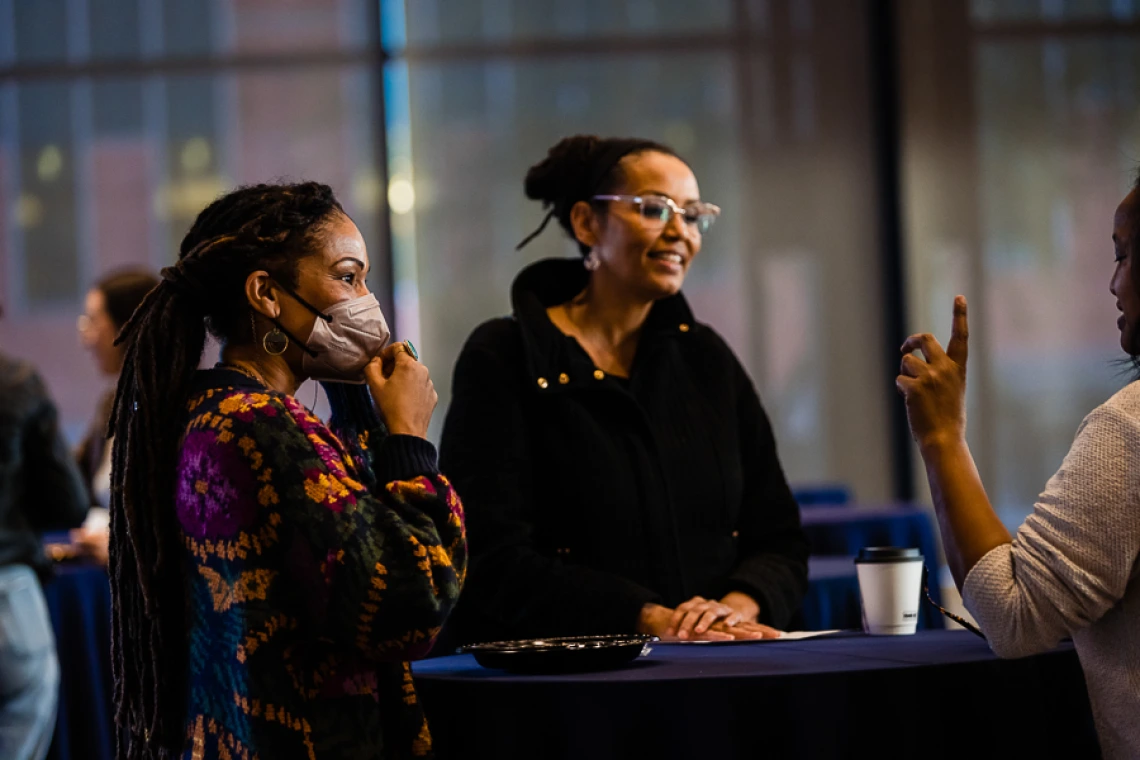 Speaker interacting with attendees during keynote reception