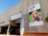 large building with a banner advertising the linda mccartney retrospective exhibit
